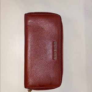 Rust colored Micheal Kors wallet